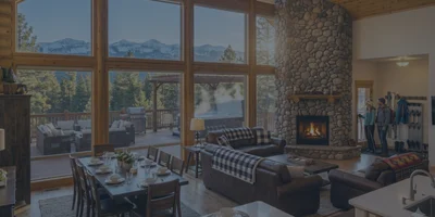 A cozy, beautifully decorated mountain cabin in Pagosa Springs featuring a large deck and private hot tub for guests.